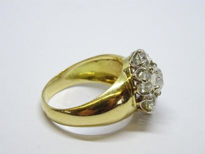 Bague en or jaune 750°/00, serti de sept...