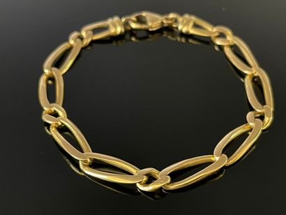 Bracelet gourmette en or 750°/00.

12.85...