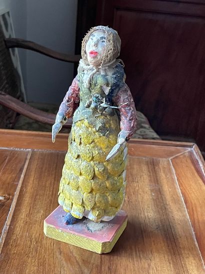 Statuette en coquillages dit 