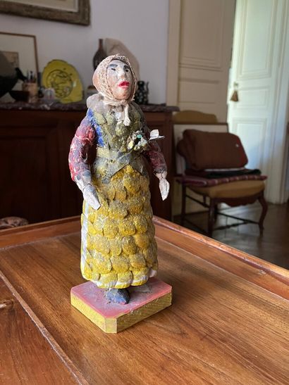 Statuette en coquillages dit 