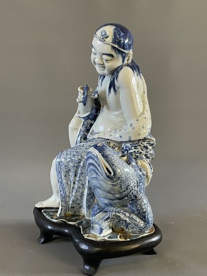 Buveur en porcelaine blanche et bleue de...