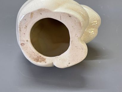 Ours en faience , émail craquelé beige.

H:...