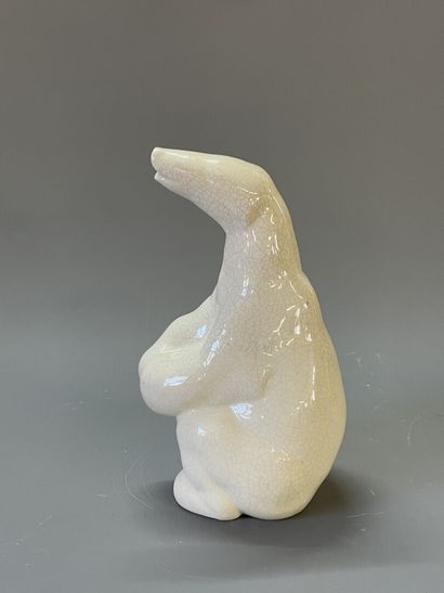 Ours en faience , émail craquelé beige.

H:...