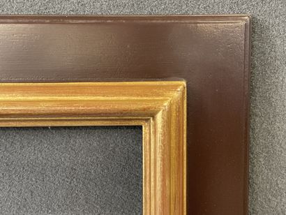 Cadre en bois laqué brun et doré

Dim. intérieur:...
