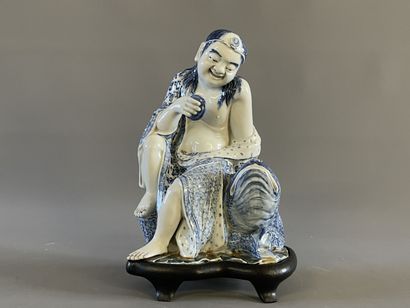 Buveur en porcelaine blanche et bleue de...