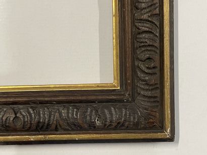 Cadre en bois sculpté patiné.

XVIII° siècle

Dim....