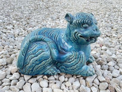 Chien de fo en terre cuite émaillé. 

13...