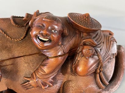 Paire de buffle et personnages sur leur dos...