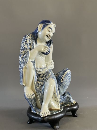 Buveur en porcelaine blanche et bleue de...