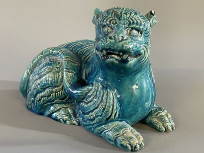 Chien de fo en terre cuite émaillé. 

13...