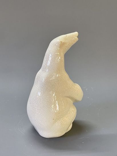 Ours en faience , émail craquelé beige.

H:...