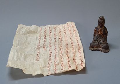 Guan Yin 

Statuette en fonte de fer , traces...