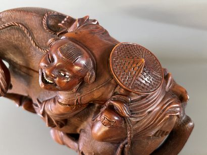 Paire de buffle et personnages sur leur dos...