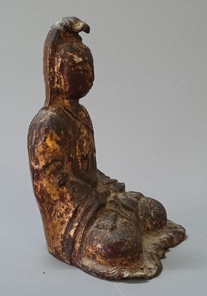 Guan Yin 

Statuette en fonte de fer , traces...