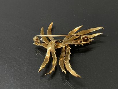 Broche en or 585°/00 sertie de deux petits...
