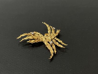 Broche en or 585°/00 sertie de deux petits...