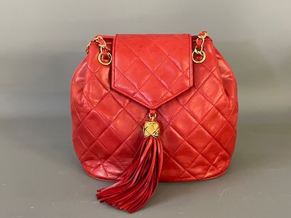 CHANEL 

Red leather handbag in quilted lambskin,...