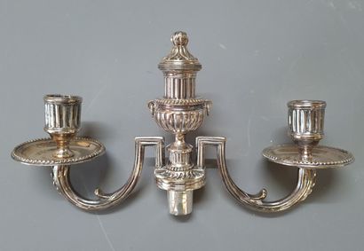 Pair of silver-plated metal arms for candlesticks.

Louis...