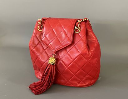 CHANEL 

Red leather handbag in quilted lambskin,...