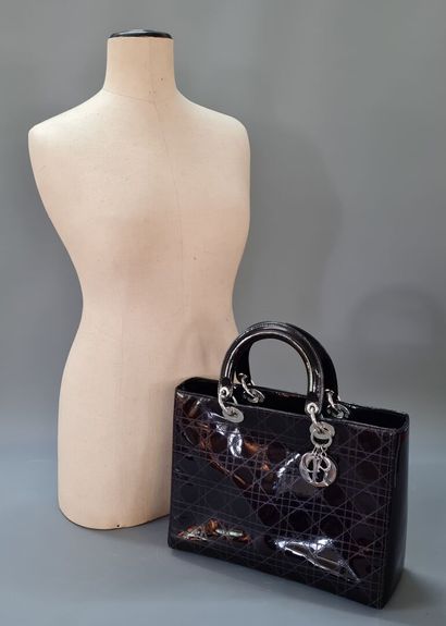 DIOR Lady Dior.

Plum patent leather bag...
