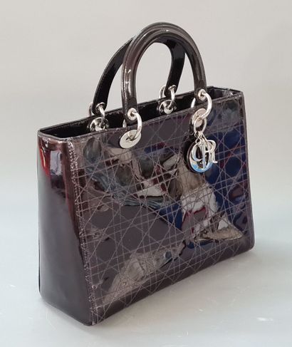 DIOR Lady Dior.

Plum patent leather bag...