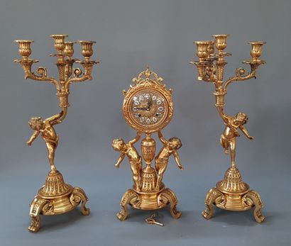 Garniture de cheminée en bronze à décor de...
