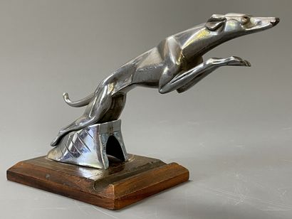 Car mascot, chromed metal lever on wooden...