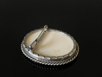 Brooch in white gold, set with a miniature...
