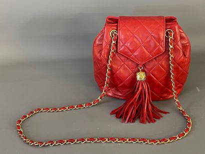 CHANEL 

Red leather handbag in quilted lambskin,...