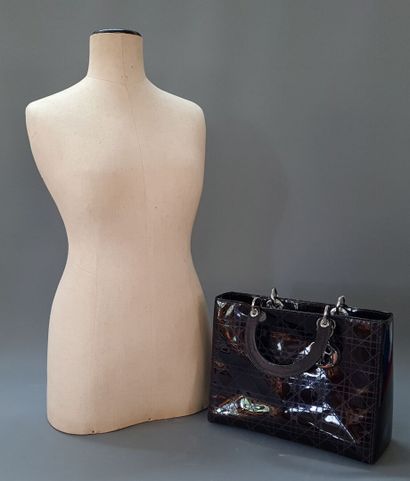 DIOR Lady Dior.

Plum patent leather bag...