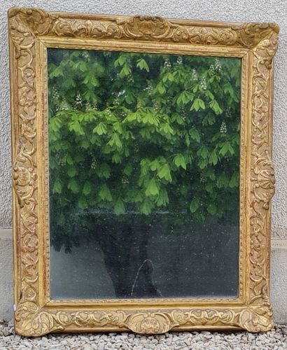 Cadre en bois et stuc doré, époque Régence,...