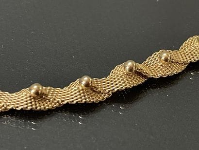 Collier en or maille tressée.

Or 750°/00

L...