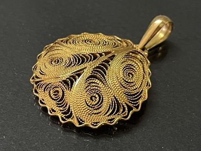 Filigree pendant in gold 750°00. 

Weight:...