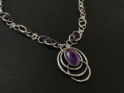 Important collier en argent orné de cabochons...