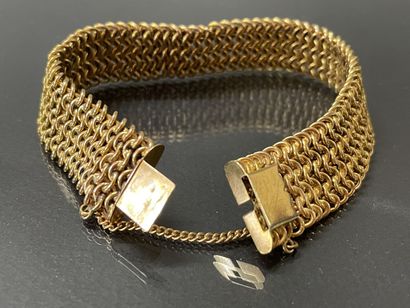 Bracelet souple en or. 

Poids: 25 g. 

Fermoir...