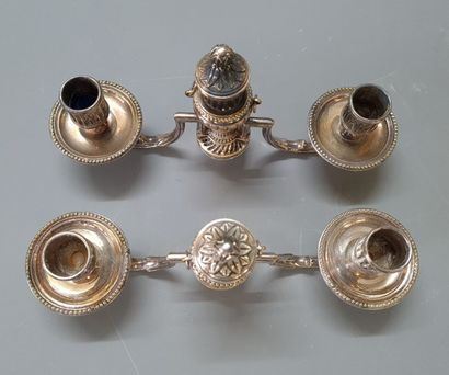 Pair of silver-plated metal arms for candlesticks.

Louis...