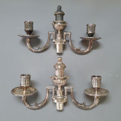 Pair of silver-plated metal arms for candlesticks.

Louis...