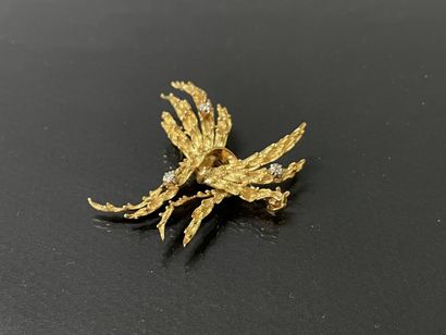 Broche en or 585°/00 sertie de deux petits...