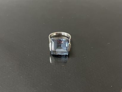 White gold ring, set with a square aquamarine...
