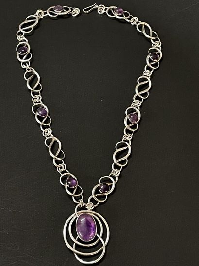 Important collier en argent orné de cabochons...