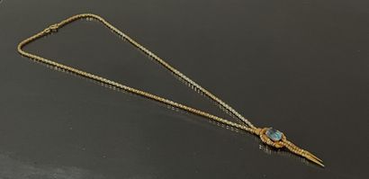 Necklace in gold 750°/00 set with a blue...