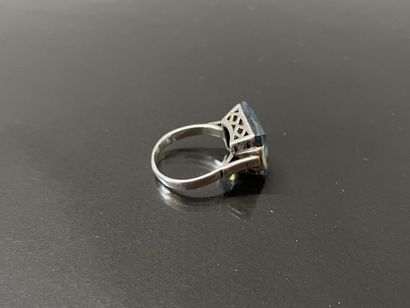 White gold ring, set with a square aquamarine...