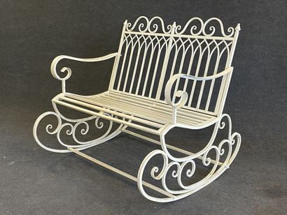 Pair of rocking garden benches in curved...