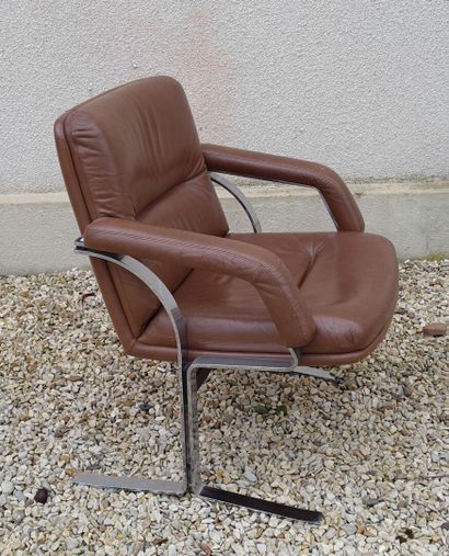 Large armchair with chromed metal base and...