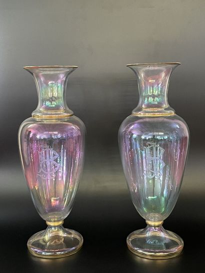 Pair of iridescent translucent glass vases...