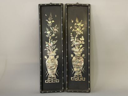 Pair of blackened wood plates with rich mother-of-pearl

representing...