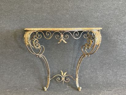 Wrought iron console with marble top.

Louis...