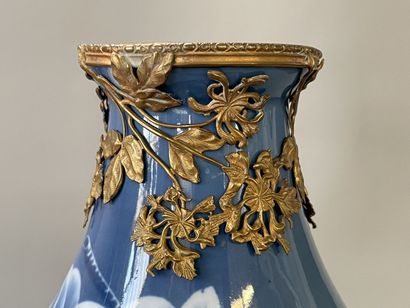 Large porcelain vase decorated with blue...