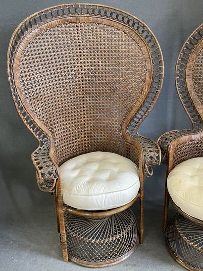 Pair of wicker armchairs with high rounded...