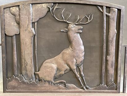 Fireguard in patinated metal representing...